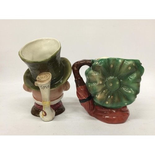 701 - TWO BESWICK CHARACTER JUGS - MICAWBER AND SAIREY GAMP - 23CM AND 16.5 CM