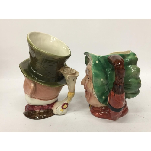 701 - TWO BESWICK CHARACTER JUGS - MICAWBER AND SAIREY GAMP - 23CM AND 16.5 CM