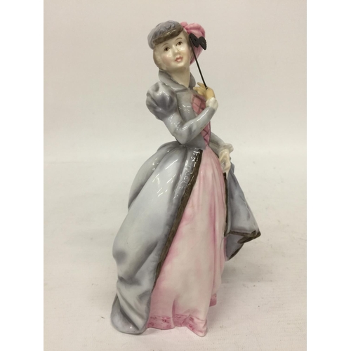 711 - A ROYAL WORCESTER FIGURINE 