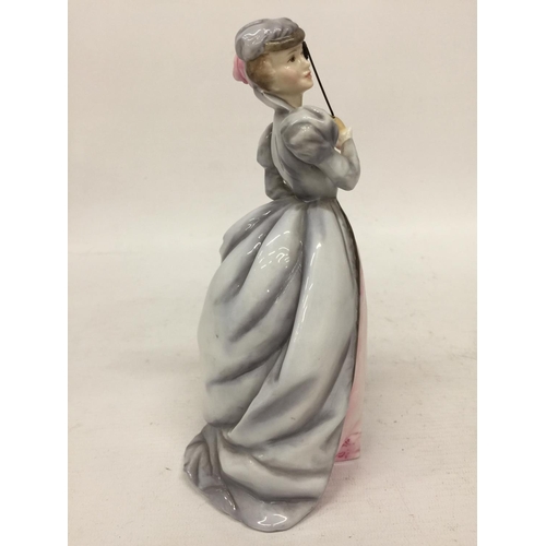 711 - A ROYAL WORCESTER FIGURINE 