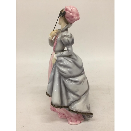 711 - A ROYAL WORCESTER FIGURINE 