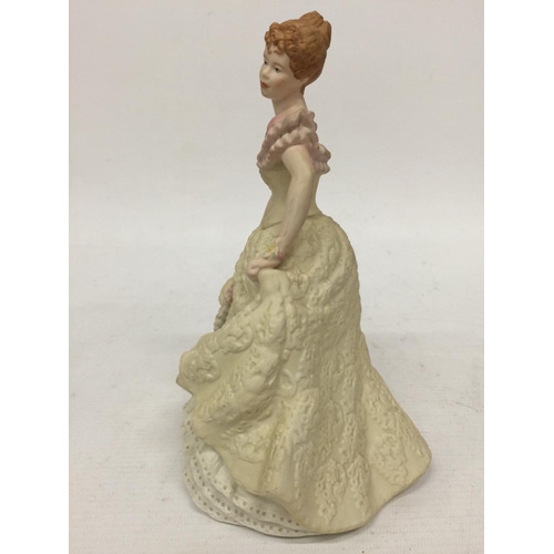 712 - A WEDGWOOD FIGURINE 