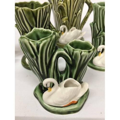 713 - FOUR SYLVAC POTTERY SWAN SPILL VASES