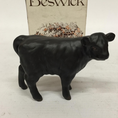 714 - A BESWICK ABERDEEN ANGUS CALF TOGETHER WITH A BLACK FACED RAM AND BLACK FACED SHEEP