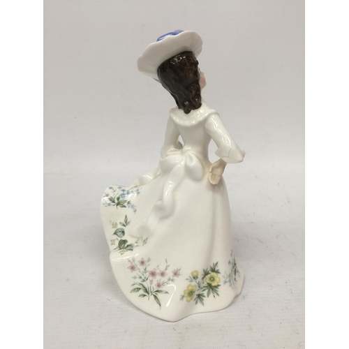 748 - A ROYAL DOULTON FIGURINE 