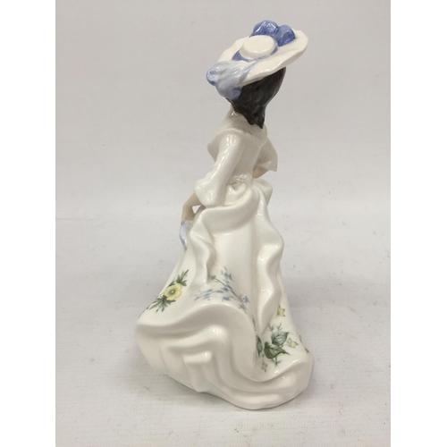 748 - A ROYAL DOULTON FIGURINE 