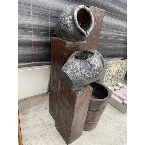 2061 - A BARREL AND URN STYLE WATER FEATURE