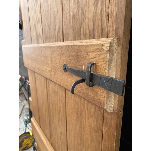 2068 - TWO WOODEN INTERNAL DOORS WITH HINGES AND CATCHES