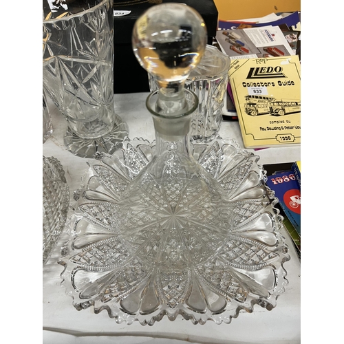 834A - A QUANTITY OF GLASS WARE TO INCLUDE VASES, DECANTERS, SERVING BOWLS, ETC.,