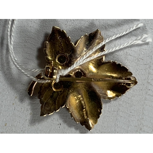 445 - A 9 CARAT GOLD MAPLE LEAF BROOCH WITH THREE STONES GROSS WEIGHT 4 GRAMS