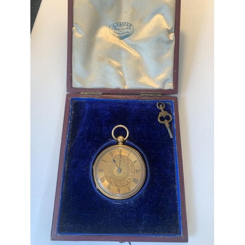 681 - A VINTAGE 18 CARAT GOLD POCKET WATCH WITH DECORATIVE FACE AND ROMAN NUMERALS, KEY AND ORIGINAL BOX G... 