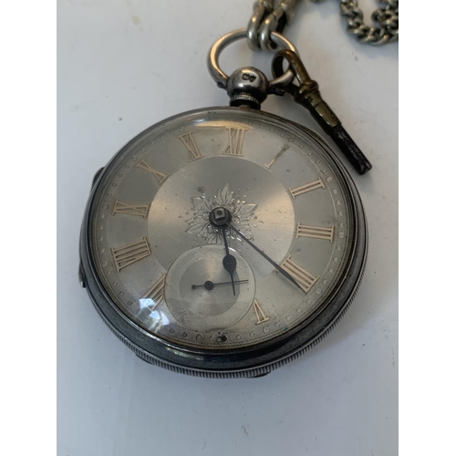 685 - A HALLMARKED LONDON SILVER POCKET WATCH WITH DECORATIVE DIAL, ROMAN NUMERALS, SUB DAIL AND KEY ON A ... 