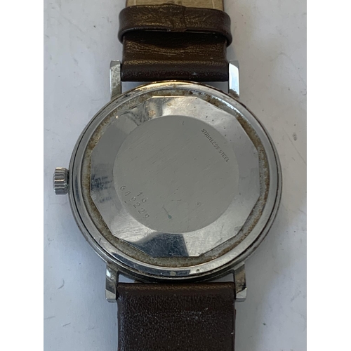 686 - A VINTAGE LONGINES CONQUEST AUTOMATIC WRIST WATCH WITH LEATHER STRAP SEEN WORKING BUT NO WARRANTY