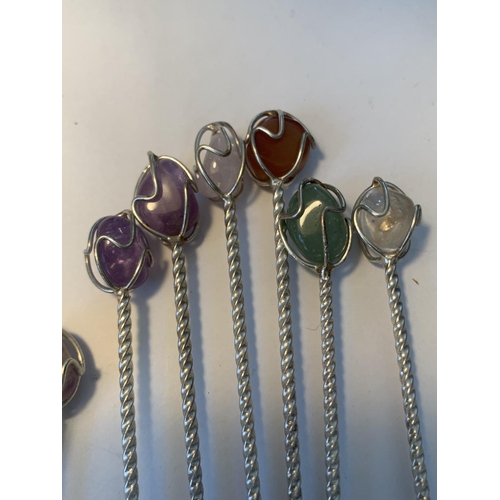 695 - SIX FORKS AND SIX SPOONS WITH SEMI PRECIOUS STONES