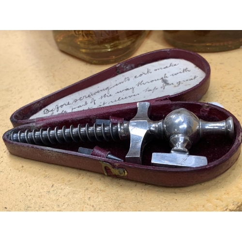 307 - A VINTAGE MINI CHAMPAGNE TAP IN A PRESENTATION BOX