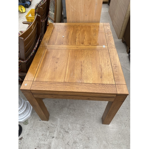 2897 - A MODERN OAK EXTENDING DINING TABLE, 48X35.5