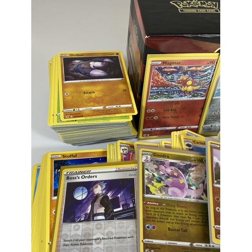 104 - APPROXIMATELY 350 POKEMON CARDS IN A TRAINER BOX, HOLOS, GAME COUNTERS ETC