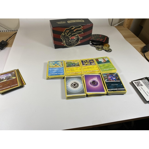 104 - APPROXIMATELY 350 POKEMON CARDS IN A TRAINER BOX, HOLOS, GAME COUNTERS ETC