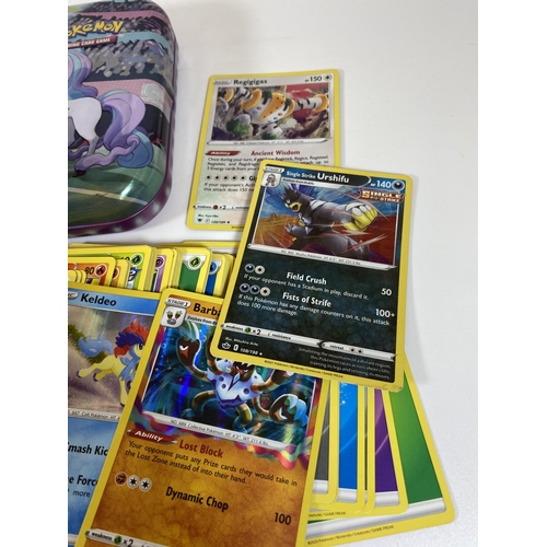 106 - A TIN OF ASSORTED POKEMON CARDS, HOLOS, RARES ETC