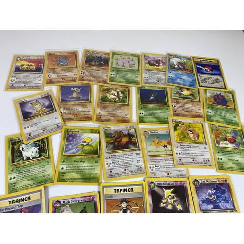 323 - A COLLECTION OF 1999 POKEMON JUNGLE SET CARDS, TEAM ROCKET HOLO CARDS, DARK ALAKAZAM ETC