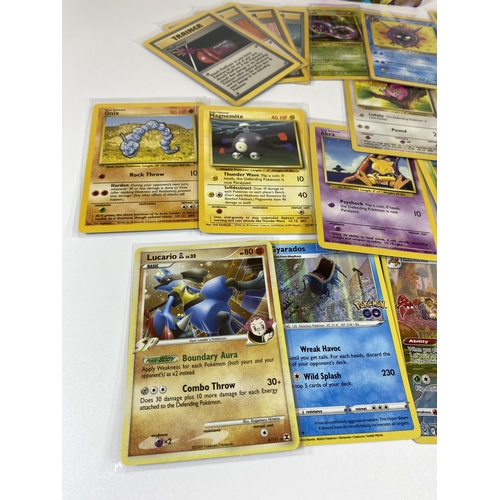 335 - A FOLDER OF 1999 POKEMON CARDS & RARE CARDS