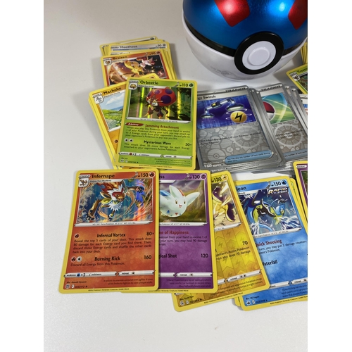 336 - A POKEMON POKE BALL TIN OF ASSORTED CARDS, RARES, HOLOS, RARE HOLO TRAINERS ETC