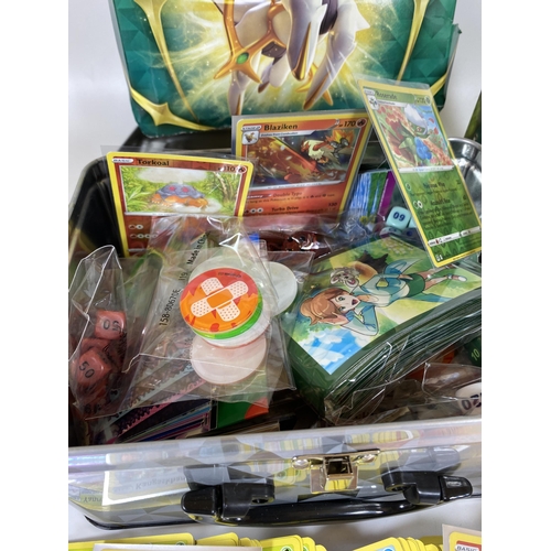 337 - A POKEMON TIN TRAINER BOX FULL OF CARDS, GAME COUNTERS, RARES, HOLOS ETC