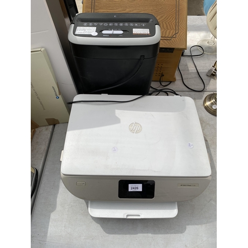 2426 - A HP PRINTER AND A PAPER SHREDDER