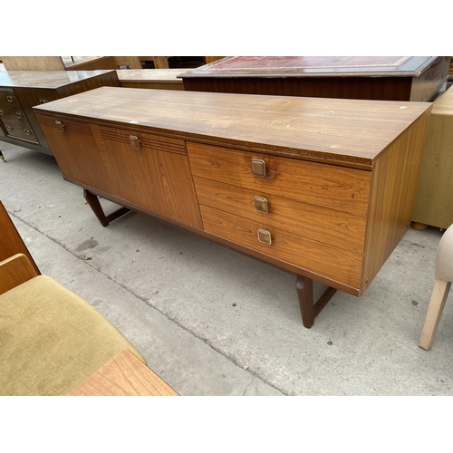 A RETRO TEAK BEAUTILITY SIDEBOARD ENCLOSING THREE DRAWERS AND TWO ...