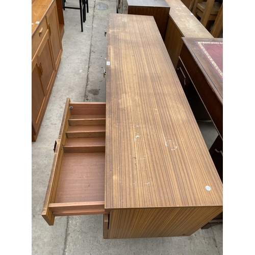A RETRO TEAK BEAUTILITY SIDEBOARD ENCLOSING THREE DRAWERS AND TWO ...