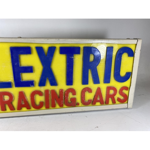 305 - A SCALEXTRIC MODEL RACING CARS ILLUMINATED BOX SIGN, 22.5 X 63.5CM