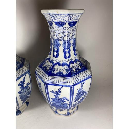 348 - A PAIR OF LARGE 20TH CENTURY CENTURY CHINESE BLUE AND WHITE OCTAGONAL FORM VASES, HEIGHT 36CM