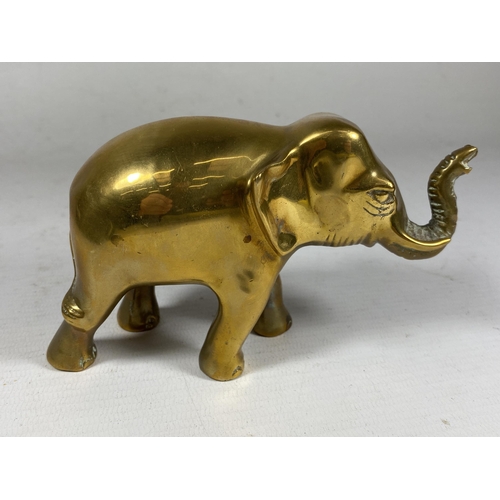 352 - A VINTAGE ORIENTAL SOLID BRASS MODEL OF AN ELEPHANT, HEIGHT 9CM