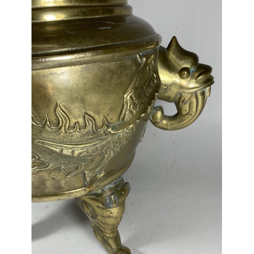 354 - A LARGE CHINESE TWIN HANDLED BRASS LIDDED TEMPLE JAR, WITH DRAGONS CHASING THE FLAMING PEARL MYTHIC ... 