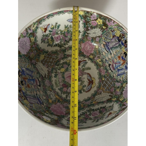 355 - A LARGE CHINESE CANTON FAMILLE ROSE PUNCH BOWL DECORATED WITH ENAMELLED FIGURAL DESIGN ON A TURNED W... 