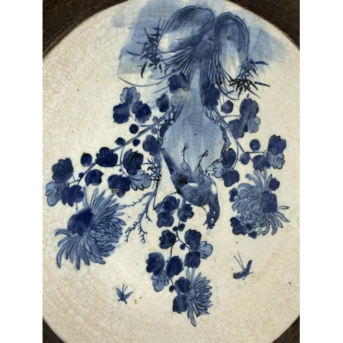 374 - A LARGE CHINESE CRACKLE GLAZE BLUE AND WHITE FLORAL CHARGER, A/F, DIAMETER 39CM