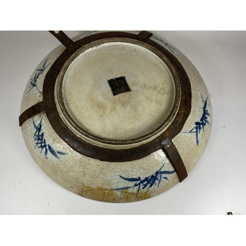 374 - A LARGE CHINESE CRACKLE GLAZE BLUE AND WHITE FLORAL CHARGER, A/F, DIAMETER 39CM