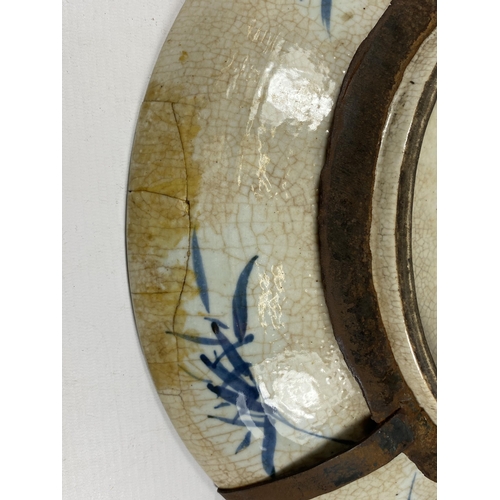 374 - A LARGE CHINESE CRACKLE GLAZE BLUE AND WHITE FLORAL CHARGER, A/F, DIAMETER 39CM