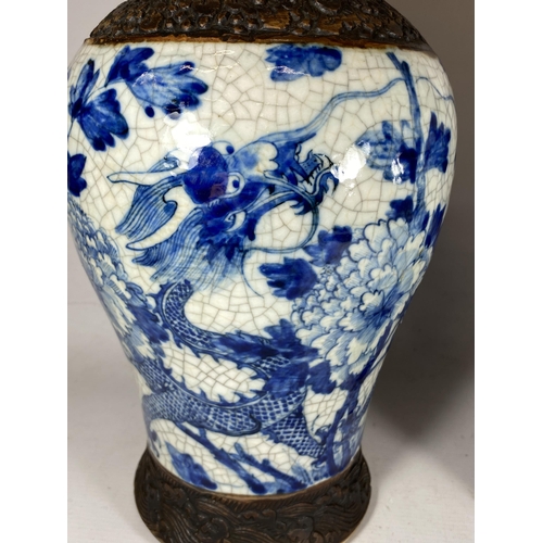 378 - A PAIR OF EARLY 20TH CENTURY CHINESE BLUE AND WHITE CRACKLE GLAZE DRAGON DESIGN VASES, A/F, HEIGHT 3... 