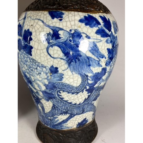 378 - A PAIR OF EARLY 20TH CENTURY CHINESE BLUE AND WHITE CRACKLE GLAZE DRAGON DESIGN VASES, A/F, HEIGHT 3... 