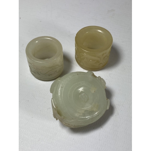 382 - A GROUP OF THREE CHINESE JADE TYPE ITEMS, CARVED THUMB RINGS AND STONE