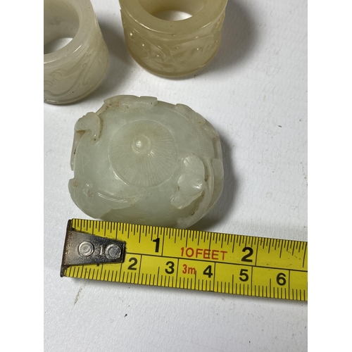 382 - A GROUP OF THREE CHINESE JADE TYPE ITEMS, CARVED THUMB RINGS AND STONE