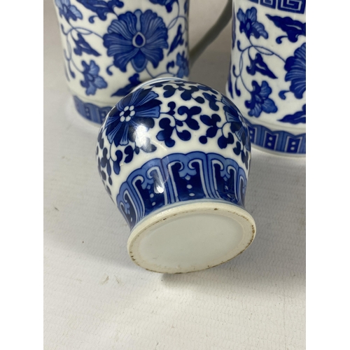 385 - A GROUP OF MODERN CHINESE BLUE AND WHITE ITEMS - LIDDED JAR AND SET OF SIX LIDDED MUGS