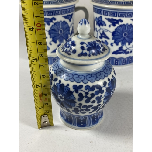 385 - A GROUP OF MODERN CHINESE BLUE AND WHITE ITEMS - LIDDED JAR AND SET OF SIX LIDDED MUGS