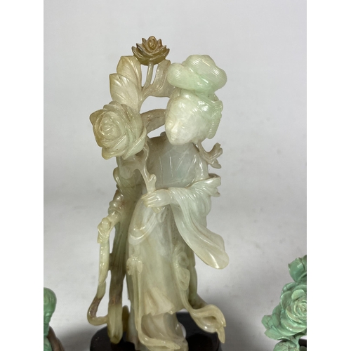 391 - A GROUP OF THREE ORIENTAL FIGURES ON STANDS TO INCLUDE A JADE TYPE HARDSTONE FIGURE, HEIGHT 16.5CM