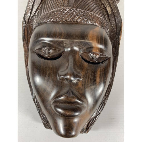 396 - A VINTAGE CARVED AFRICAN TRIBAL WALL MASK, LENGTH 37CM