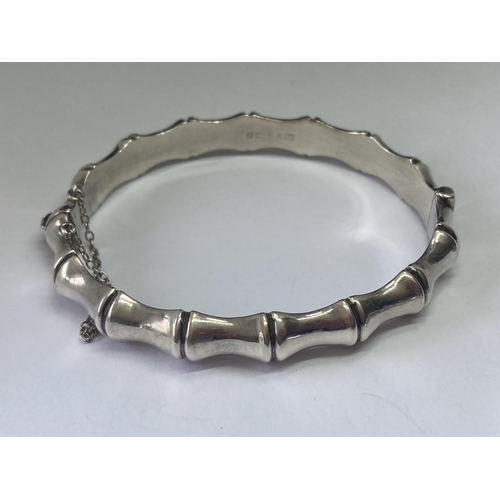 545 - TWO SILVER BANGLES