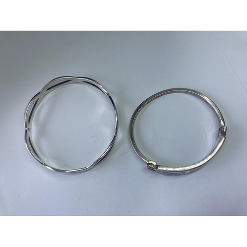 553 - TWO SILVER BANGLES