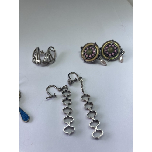 556 - FIVE PAIRS OF SILVER EARRINGS