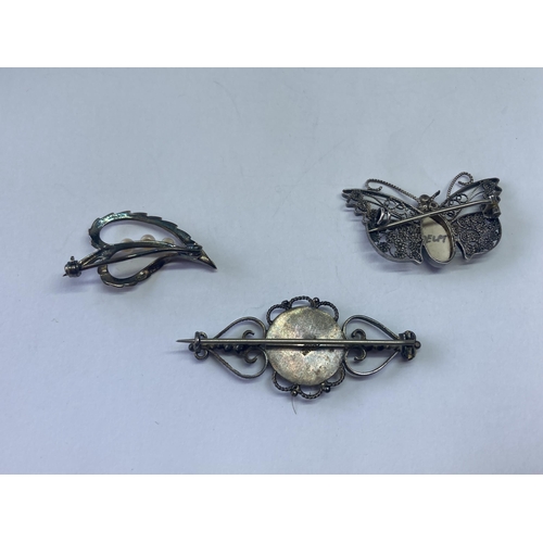 567 - THREE SILVER PIN BROOCHES